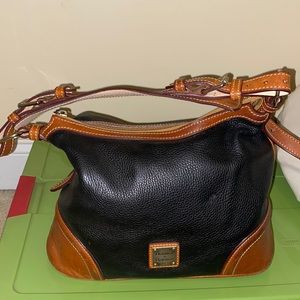 Dooney & Bourke black and brown satchel. Good condition